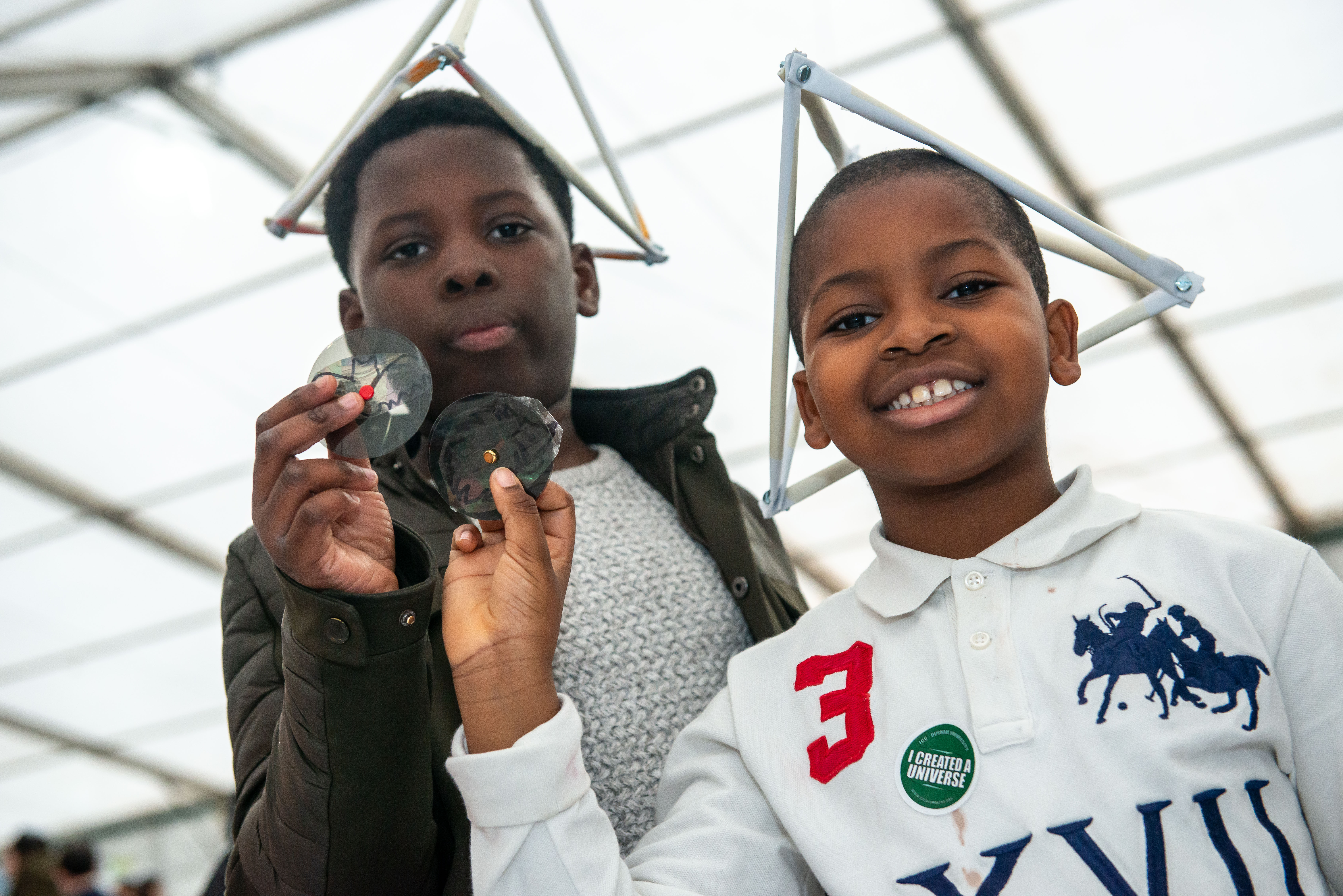 Two children attend celebrate science 2023