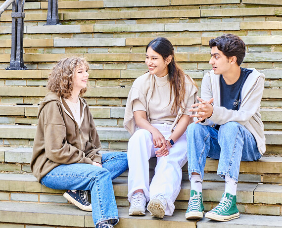 Students sat on Silver Street Steps in Durham City Centre