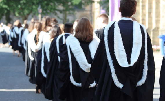 Graduates walking to cathedral from behind