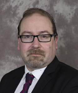 Simon James headshot