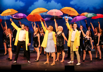 Performance of singing in the rain