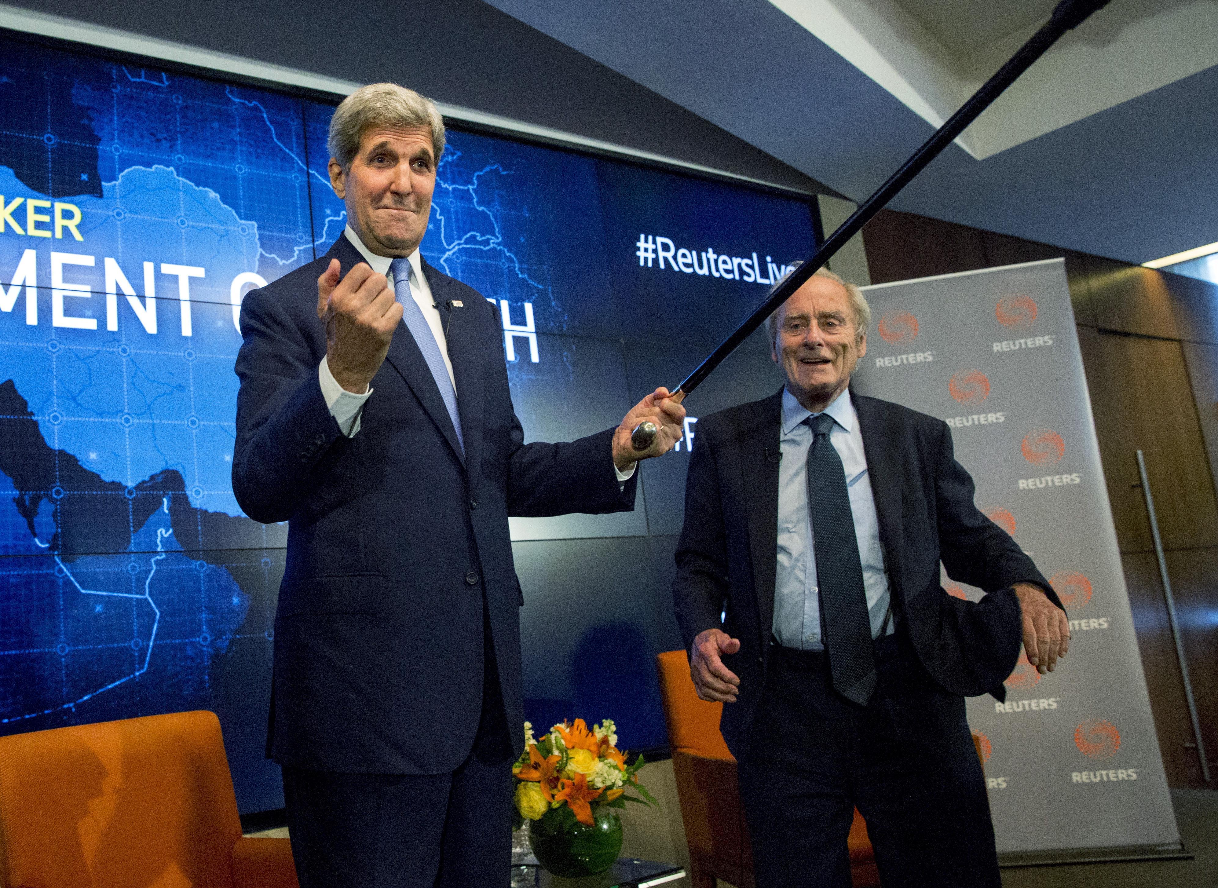 Sir Harry Evans and former Secretary of State John Kerry