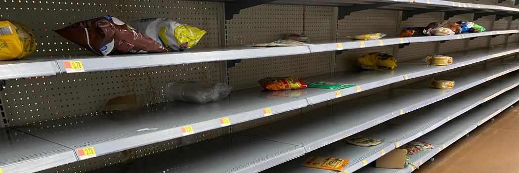 Empty supermarket shelving
