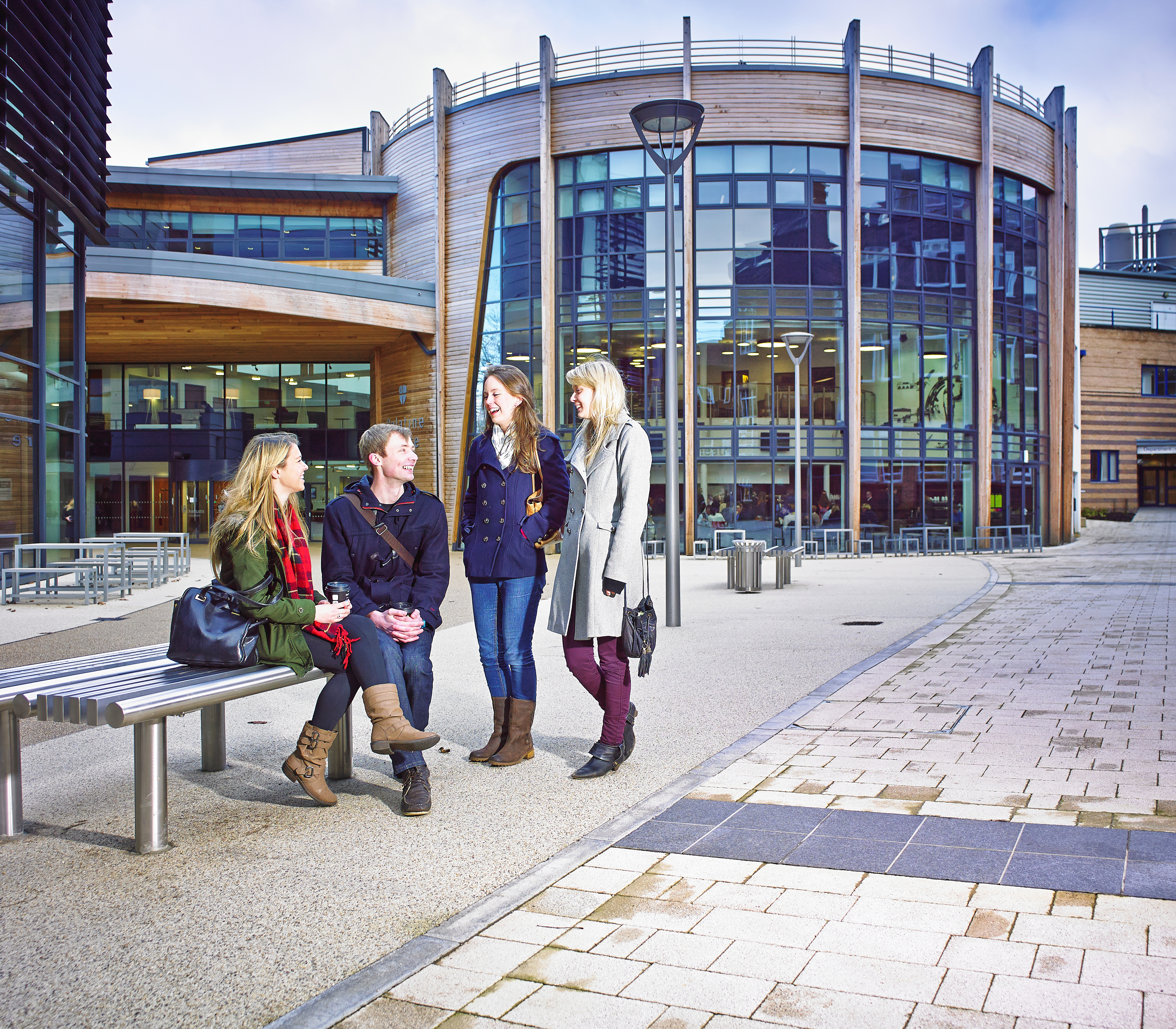 four students chatting
