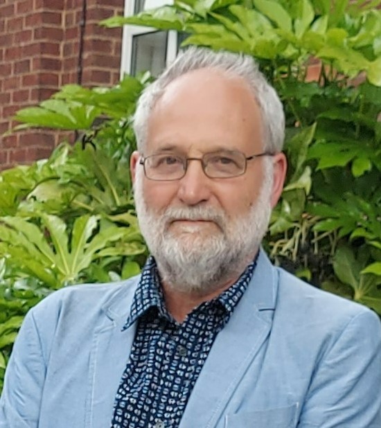 A headshot of Dr Ben Campbell