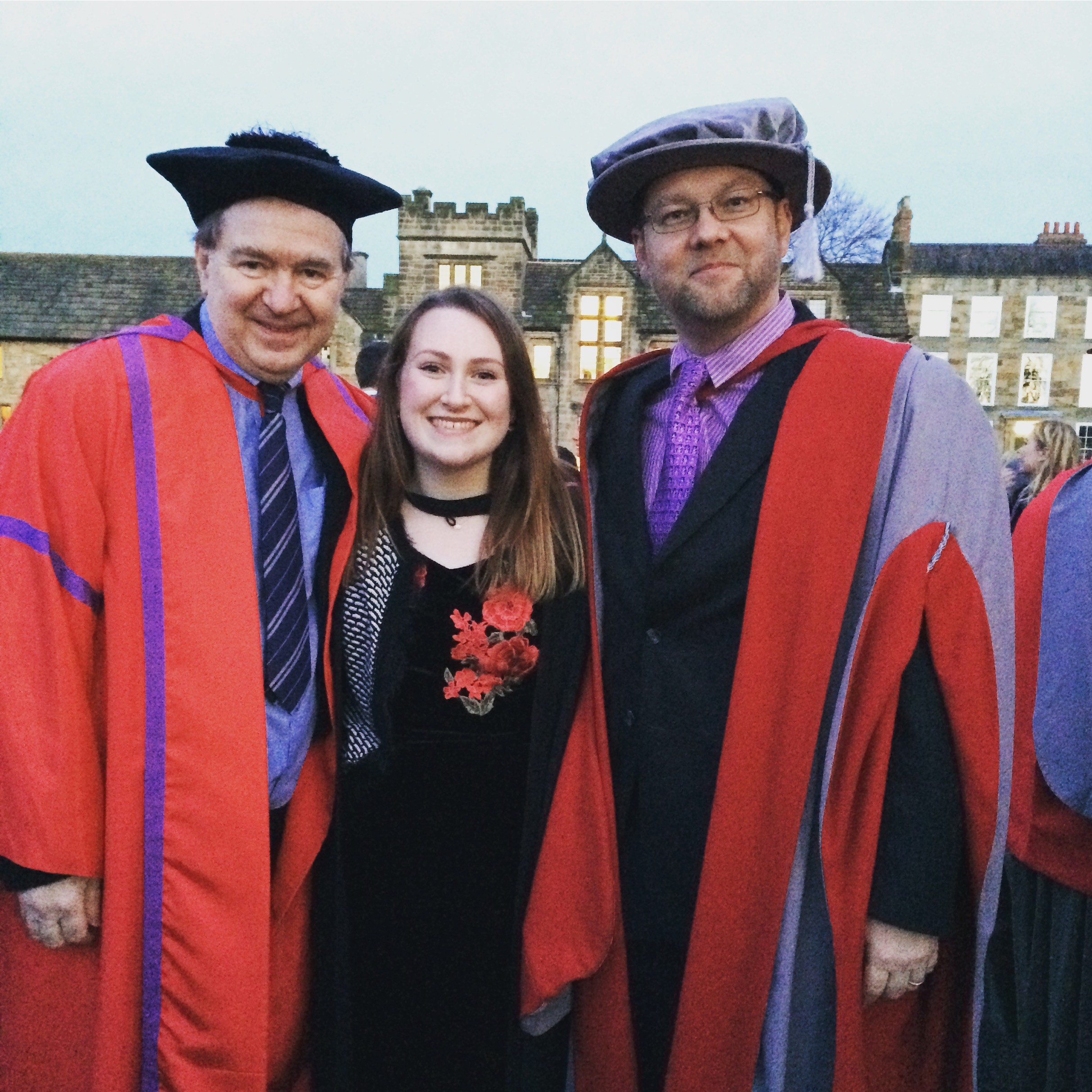 Emma Maslin poses with Dr Jonathan Tummons and ... at the Summer graduation ceremony in 2015.