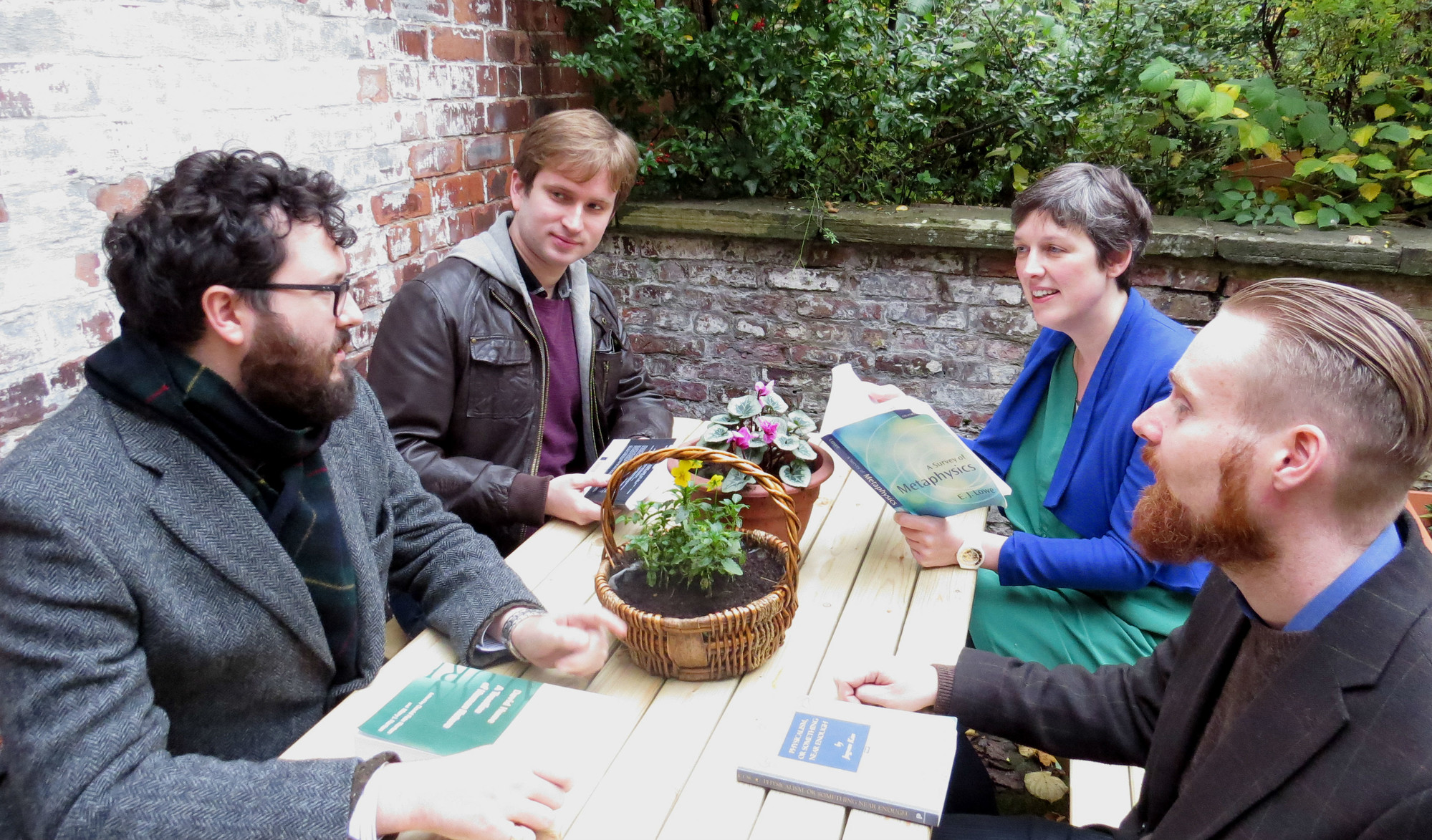 Group of people discussing philosophy books
