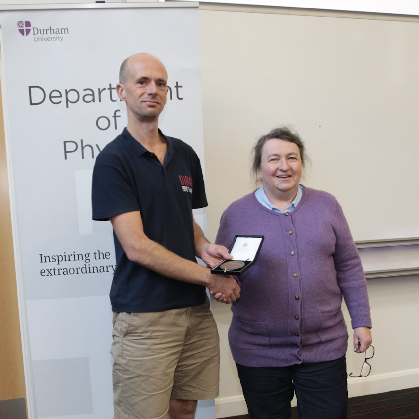 Alastair Basden receiving a staff excellence award from Prof Paula Chadwick
