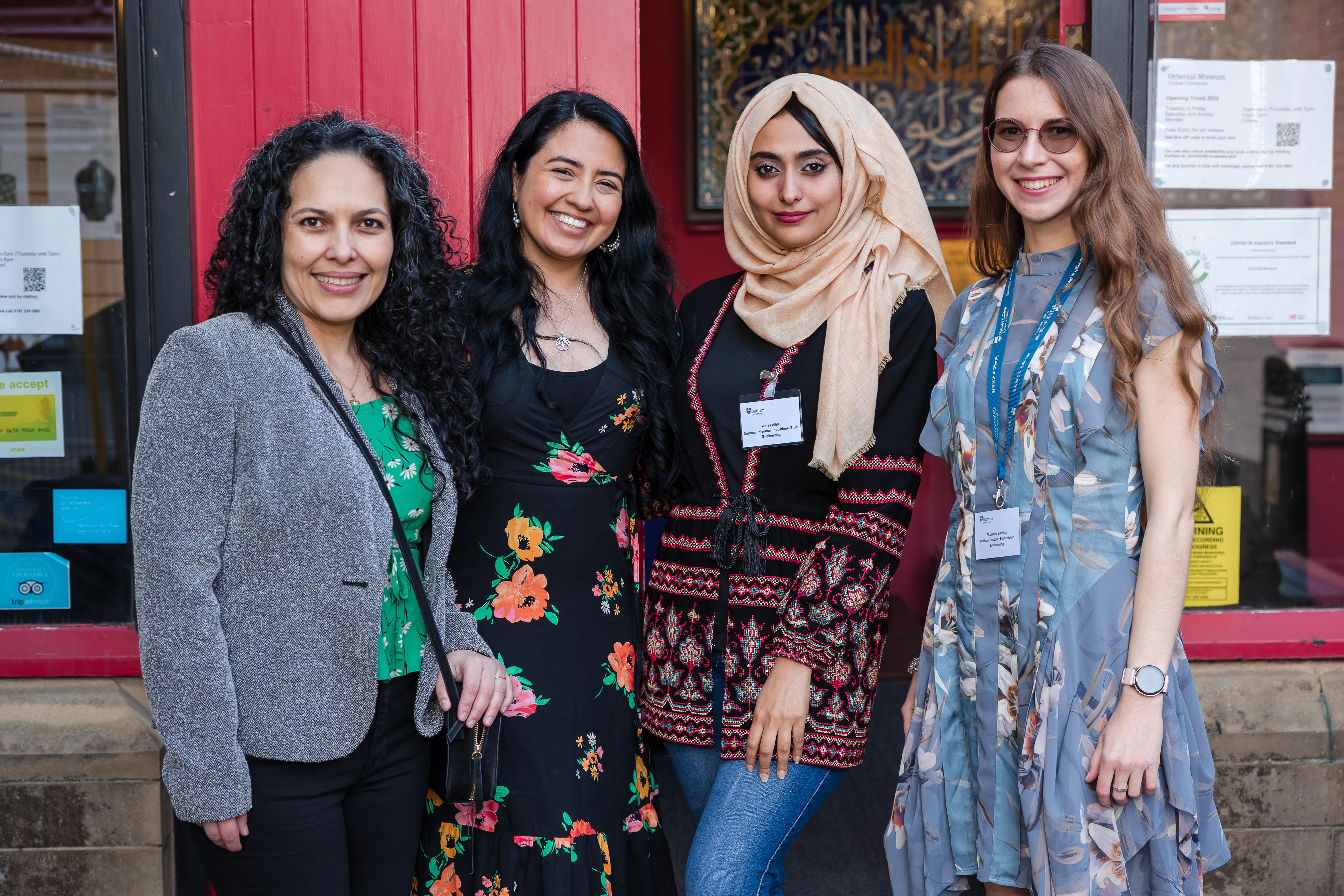 Four female scholars posing for the camera