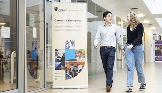 Two students walking in to Careers Centre in Palatine