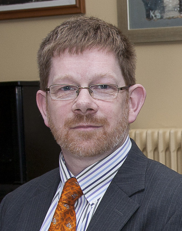 Headshot of Lewis Ayres