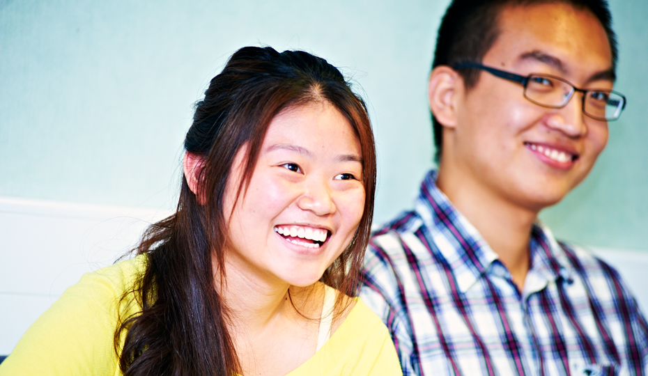 Students laughing in a seminar